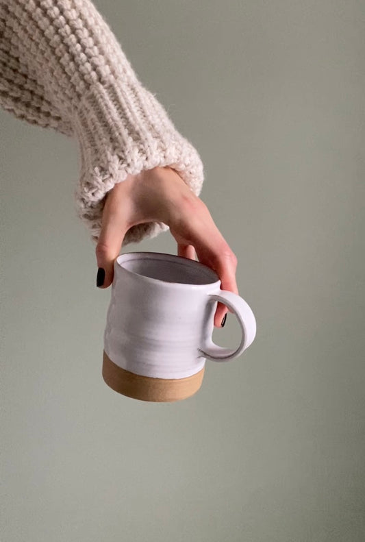 White Mug on Warm Brown Clay